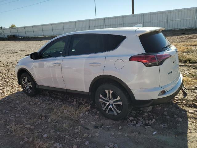 JTMBFREV6JJ209741 - 2018 TOYOTA RAV4 LE WHITE photo 2