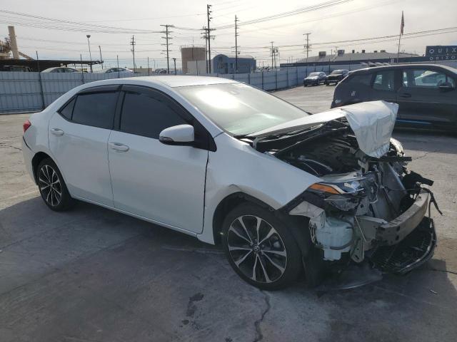 5YFBURHE2HP585313 - 2017 TOYOTA COROLLA L WHITE photo 4