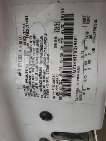 1FAFP34N35W299801 - 2005 FORD FOCUS ZX4 WHITE photo 12