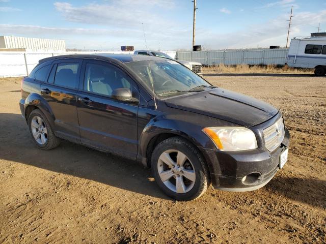 1B3CB3HA6BD196335 - 2011 DODGE CALIBER MAINSTREET BLACK photo 4