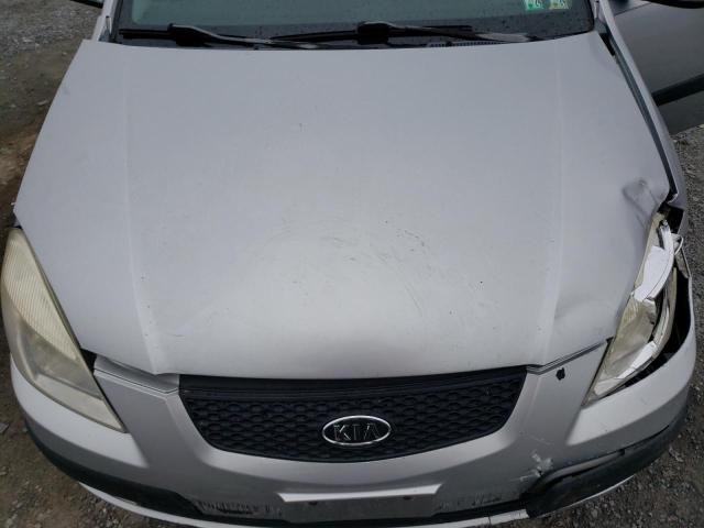 KNADE223796556416 - 2009 KIA RIO BASE SILVER photo 11