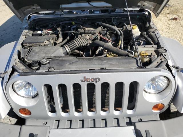 1J4BA5H16BL627992 - 2011 JEEP WRANGLER U SAHARA SILVER photo 12