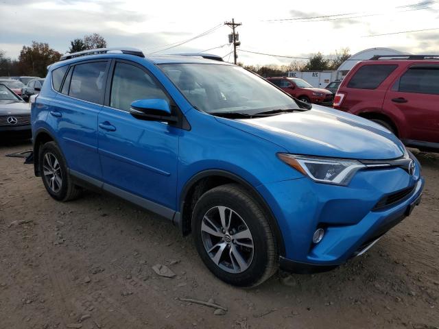 JTMRFREV1GD178226 - 2016 TOYOTA RAV4 XLE BLUE photo 4