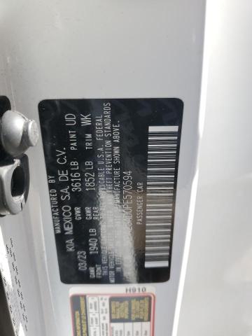 3KPA25AD0PE570594 - 2023 KIA RIO S WHITE photo 12