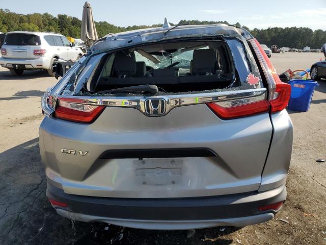 2HKRW5H35JH425610 - 2018 HONDA CR-V LX SILVER photo 6