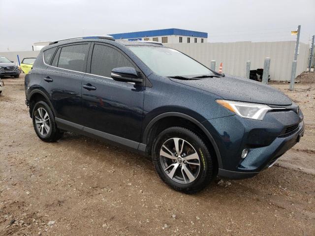 JTMRFREV6JJ230197 - 2018 TOYOTA RAV4 ADVENTURE BLUE photo 4