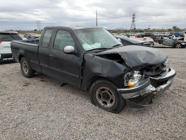 1FTDX176XVKC66523 - 1997 FORD F150 BLACK photo 4