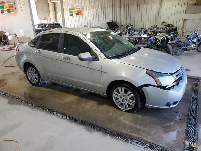 1FAHP3HN9BW157371 - 2011 FORD FOCUS SEL SILVER photo 4