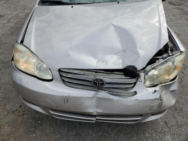 1NXBR32E63Z127966 - 2003 TOYOTA COROLLA CE SILVER photo 11