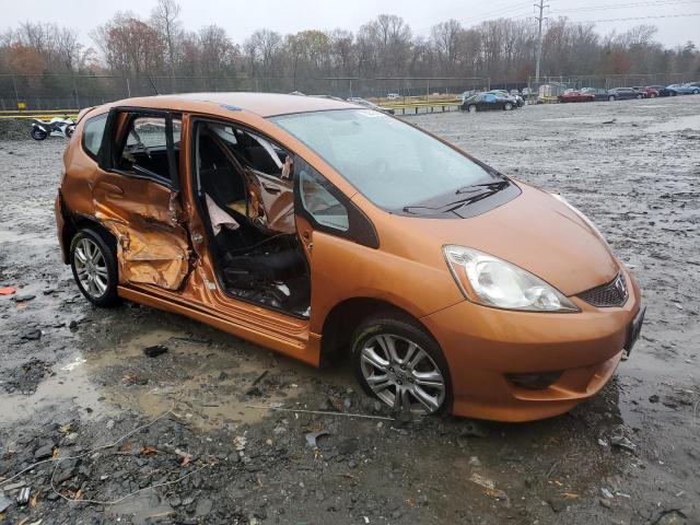 JHMGE8H46AC022945 - 2010 HONDA FIT SPORT ORANGE photo 4