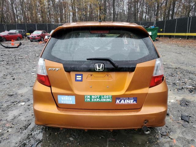 JHMGE8H46AC022945 - 2010 HONDA FIT SPORT ORANGE photo 6