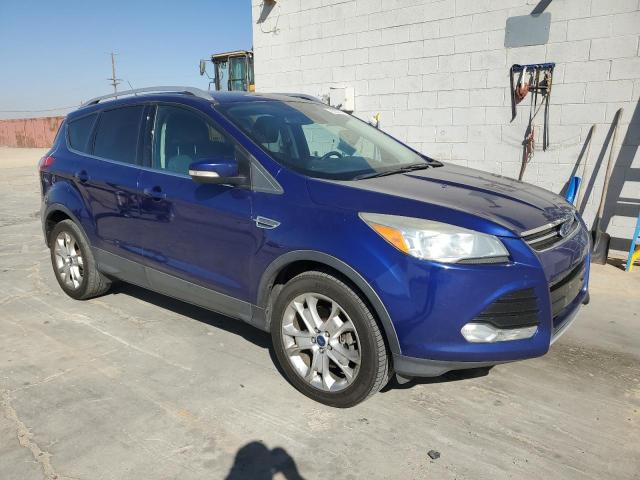 1FMCU9J9XGUB20390 - 2016 FORD ESCAPE TITANIUM BLUE photo 4