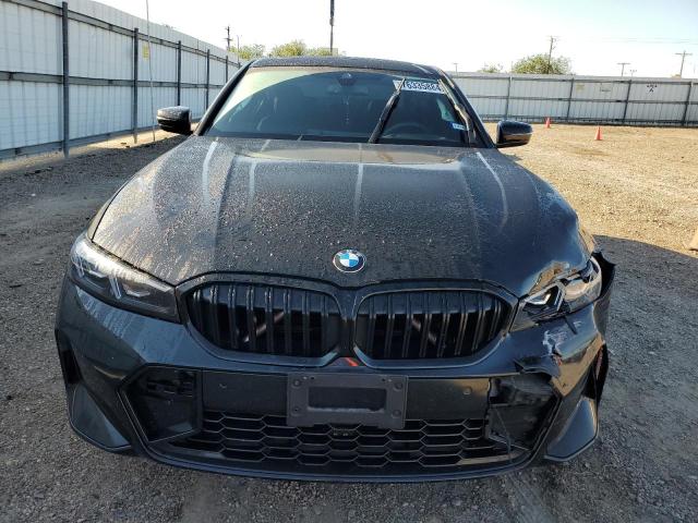 3MW69FF08R8E21524 - 2024 BMW 330I BLACK photo 5