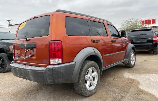 1D8GT28K57W568812 - 2007 DODGE NITRO SXT ORANGE photo 4