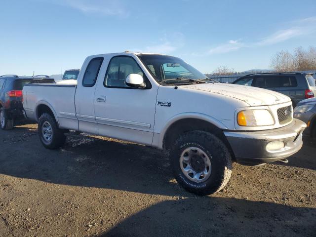 1FTFX28L7VKC32879 - 1997 FORD F250 WHITE photo 4