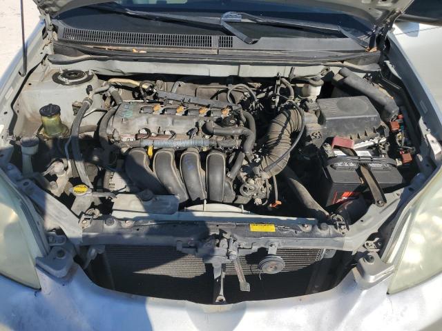 2T1KR32E74C249433 - 2004 TOYOTA COROLLA MA XR SILVER photo 11
