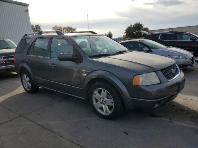 1FMDK06135GA75524 - 2005 FORD FREESTYLE LIMITED GRAY photo 4