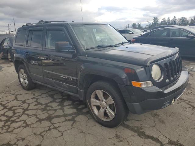 1J4NF4GB8BD109041 - 2011 JEEP PATRIOT LATITUDE BLACK photo 4