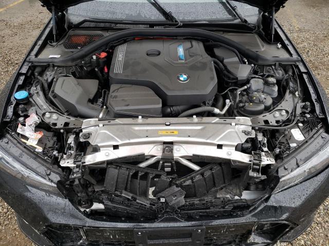 3MW39FF03P8C93290 - 2023 BMW 330E BLACK photo 11