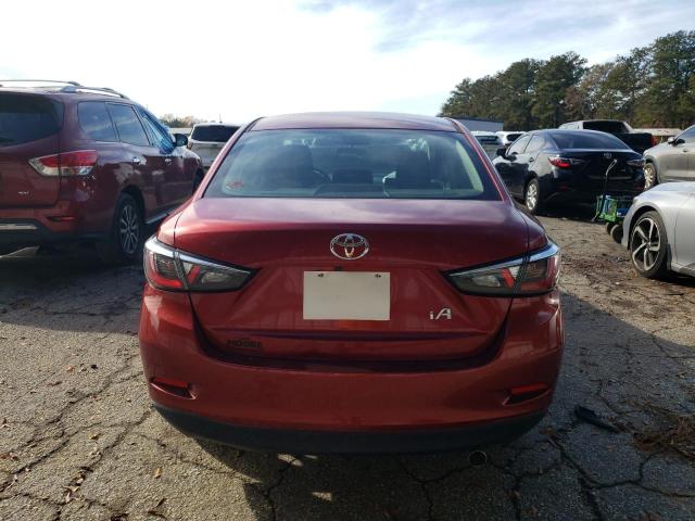 3MYDLBYV8JY329882 - 2018 TOYOTA YARIS IA RED photo 6