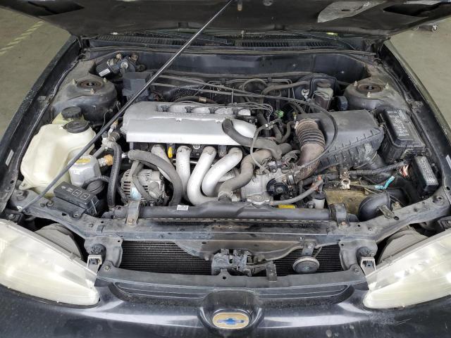 1Y1SK5489XZ442146 - 1999 CHEVROLET GEO PRIZM BASE BLACK photo 11