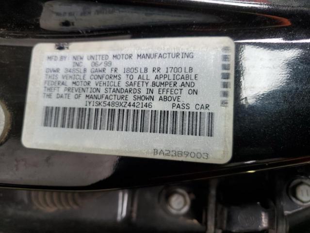 1Y1SK5489XZ442146 - 1999 CHEVROLET GEO PRIZM BASE BLACK photo 12