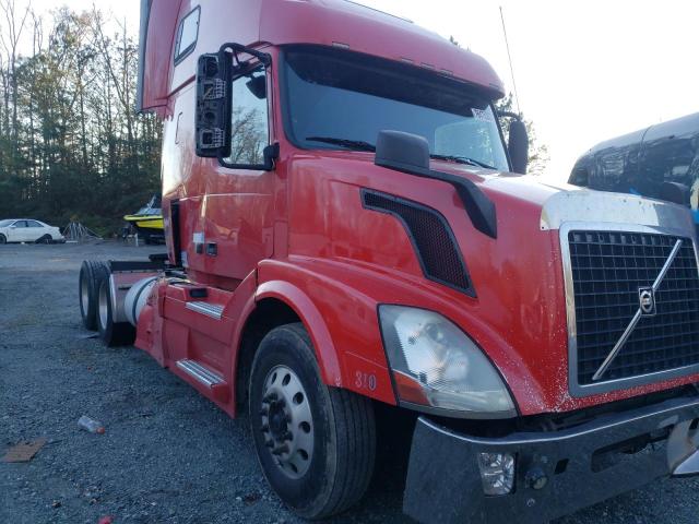 4V4NC9TJ3FN917407 - 2015 VOLVO VN VNL RED photo 1