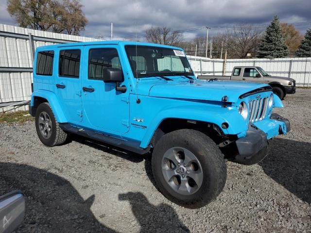 1C4BJWEG7JL900148 - 2018 JEEP WRANGLER U SAHARA BLUE photo 4