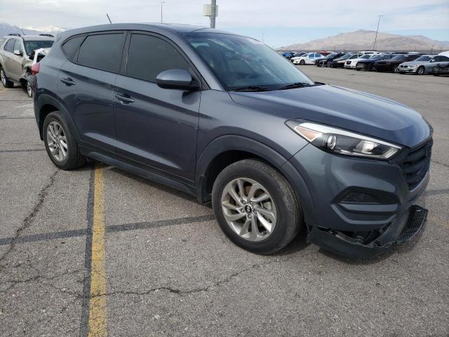 KM8J23A44HU593962 - 2017 HYUNDAI TUCSON SE GRAY photo 4