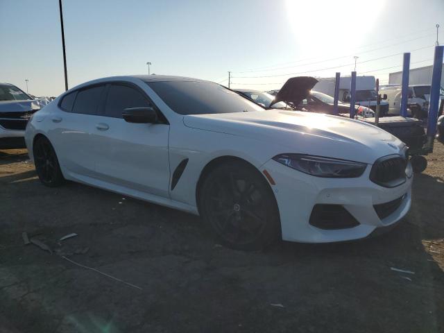 WBAGV8C01PCL31007 - 2023 BMW M850XI WHITE photo 4