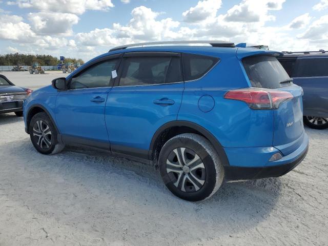 2T3ZFREV1GW235298 - 2016 TOYOTA RAV4 LE BLUE photo 2