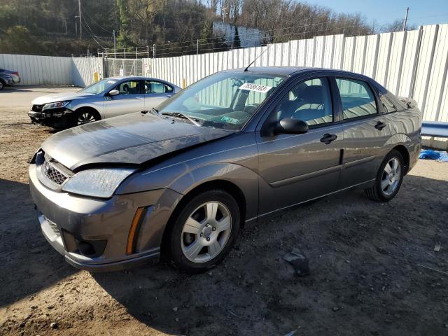 1FAFP34NX7W187158 - 2007 FORD FOCUS ZX4 GRAY photo 1