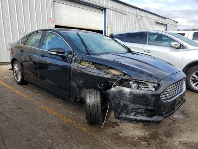 3FA6P0H91FR179110 - 2015 FORD FUSION SE BLACK photo 4