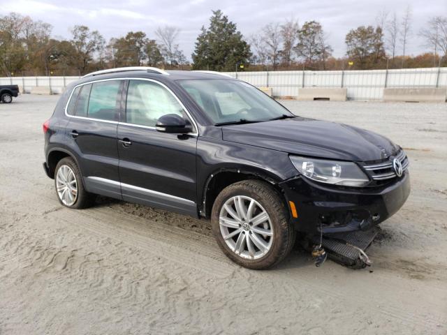 WVGBV3AX2EW541557 - 2014 VOLKSWAGEN TIGUAN S BLACK photo 4