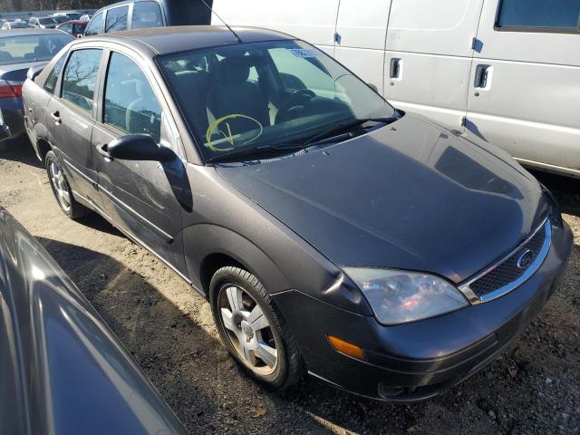 1FAFP34N26W111805 - 2006 FORD FOCUS ZX4 GRAY photo 4