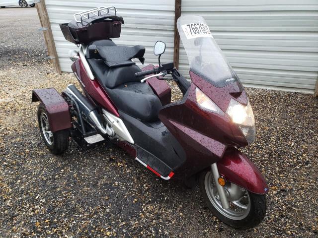 JH2PF01109K700002 - 2009 HONDA FSC600 D MAROON photo 1