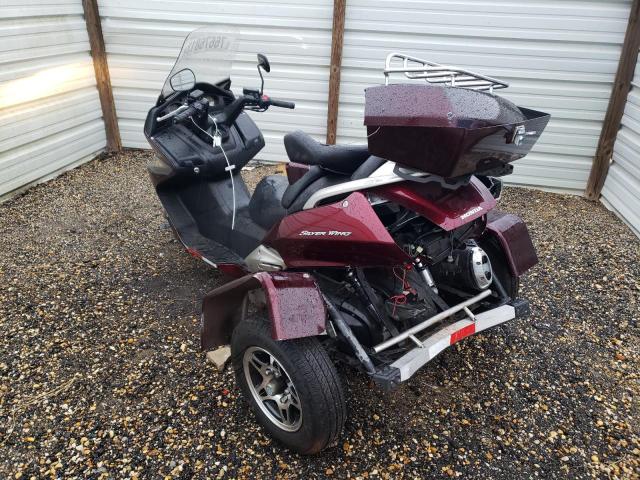 JH2PF01109K700002 - 2009 HONDA FSC600 D MAROON photo 3