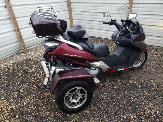 JH2PF01109K700002 - 2009 HONDA FSC600 D MAROON photo 4