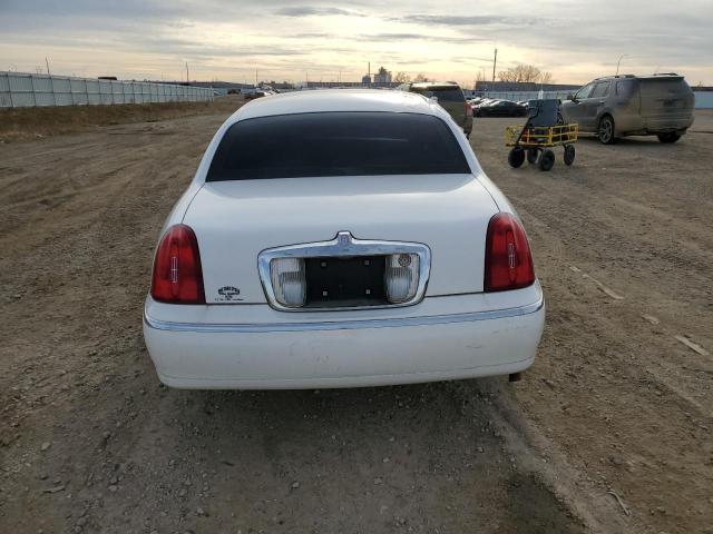 1LNHM81W4XY669467 - 1999 LINCOLN TOWN CAR EXECUTIVE WHITE photo 6