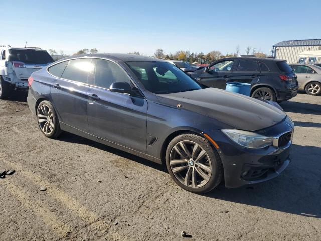 WBA3X9C57GD869778 - 2016 BMW 335 XIGT BLACK photo 4