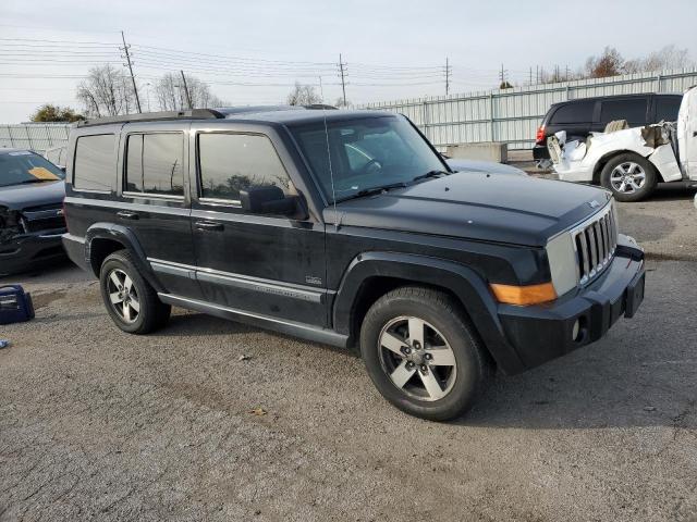 1J8HG48K97C696340 - 2007 JEEP COMMANDER BLACK photo 4