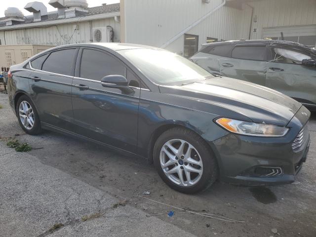 1FA6P0H78G5111339 - 2016 FORD FUSION SE GREEN photo 4