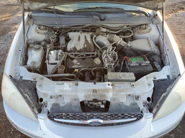 1FAFP5324YG247661 - 2000 FORD TAURUS SE SILVER photo 11