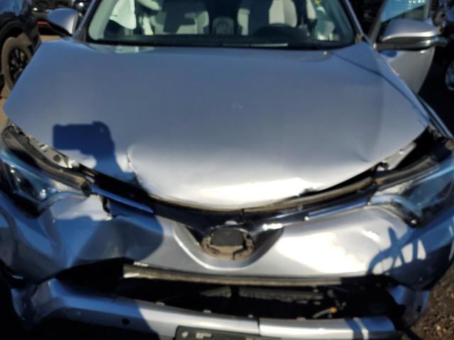 2T3RFREVXHW631067 - 2017 TOYOTA RAV4 XLE SILVER photo 11