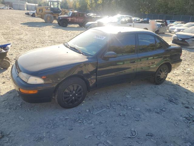 1Y1SK5261SZ077665 - 1995 GEO PRIZM BASE BLACK photo 1