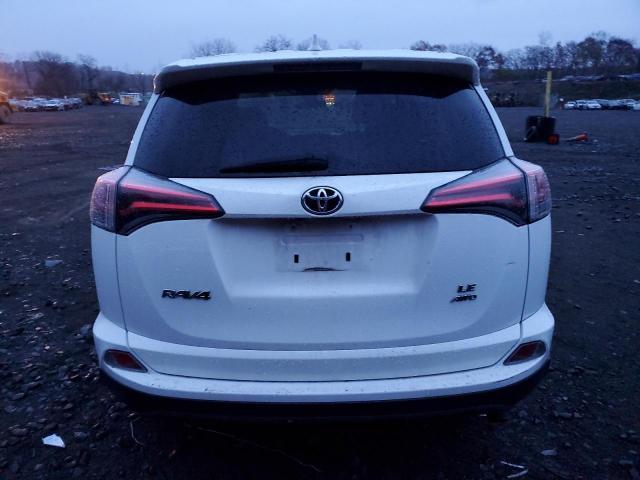 2T3BFREV6JW771639 - 2018 TOYOTA RAV4 LE WHITE photo 6