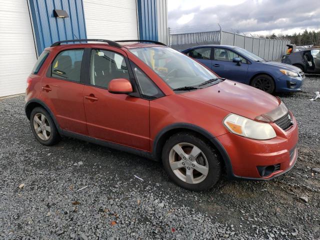 JS2YB5A27B6300344 - 2011 SUZUKI SX4 JX RED photo 4