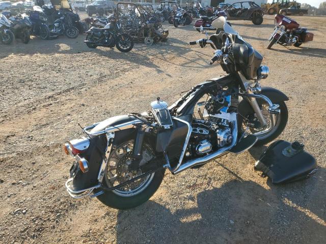 1HD1FC4107Y724675 - 2007 HARLEY-DAVIDSON FLHTCUI შავი ფოტო 4