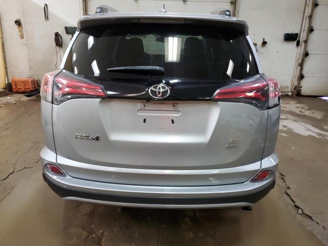 2T3JFREVXHW593899 - 2017 TOYOTA RAV4 SE SILVER photo 6