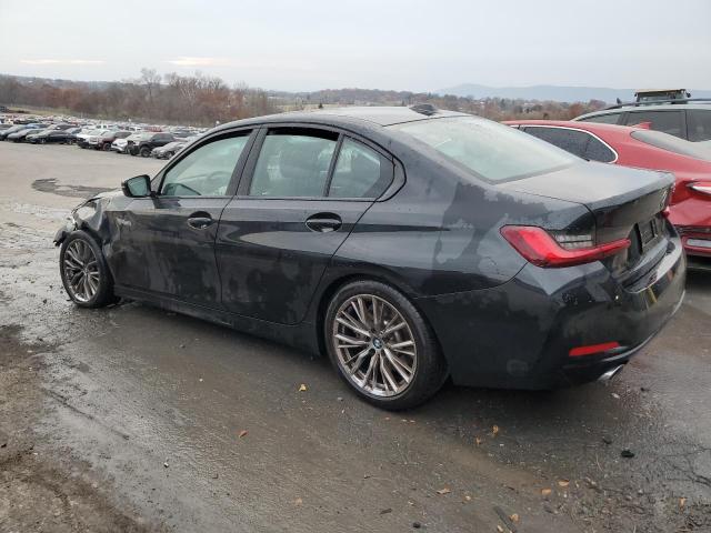 3MW69FF06P8D51860 - 2023 BMW 330I BLACK photo 2